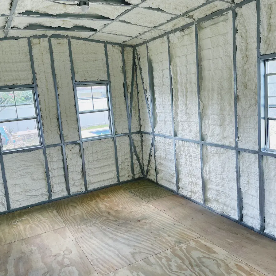Closed-cell spray foam insulation applied to wall cavities in a residential project in Damascus